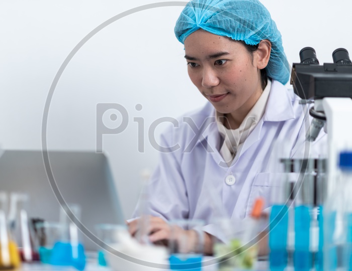 Researcher Or Scientist Using Laptop In a Laboratory