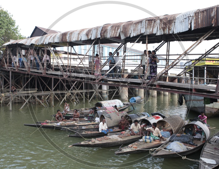 Fishermen with their Gondola boats alongside the Hooghly River