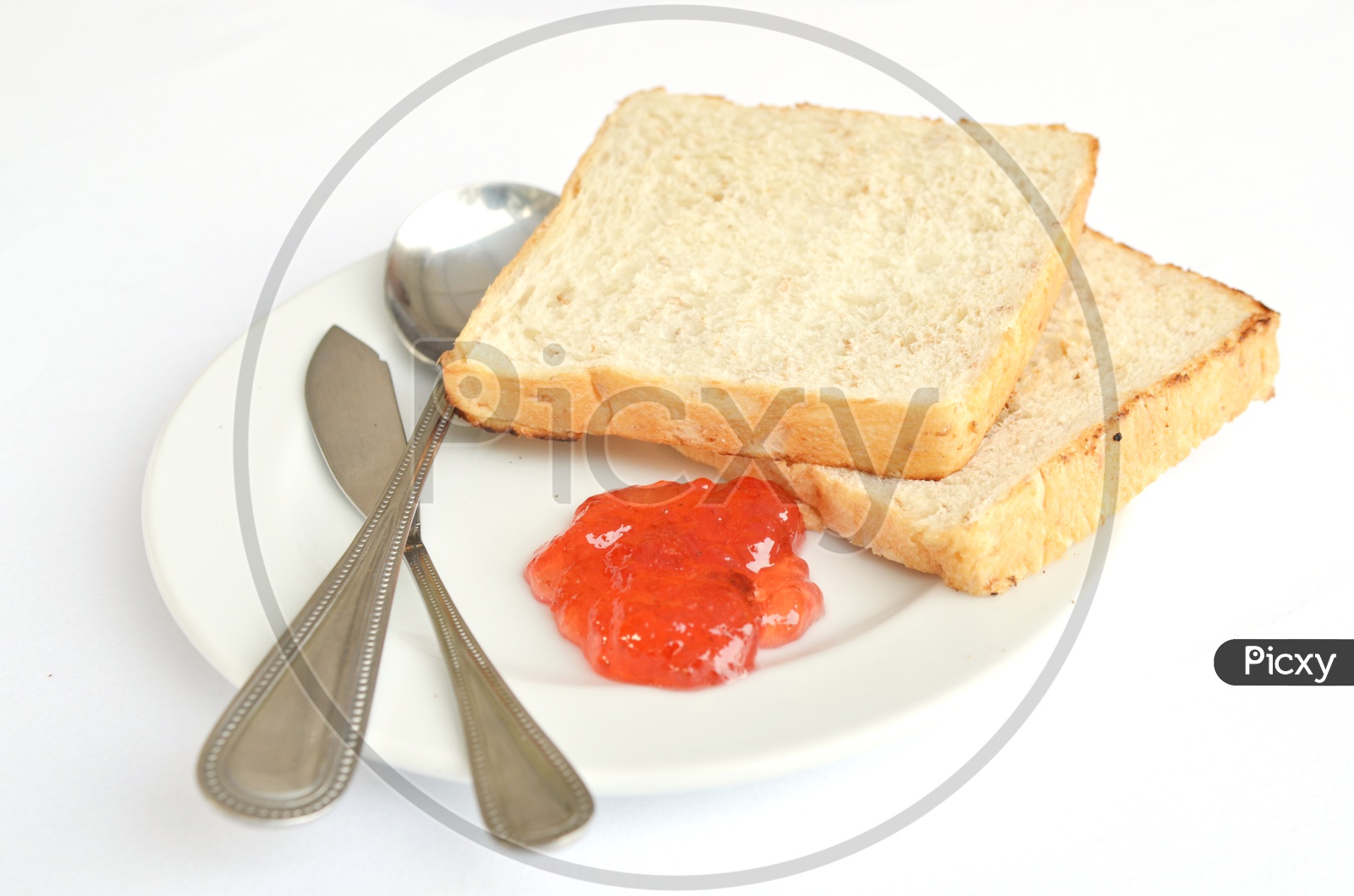 Bread Toast And Jam in a Plate