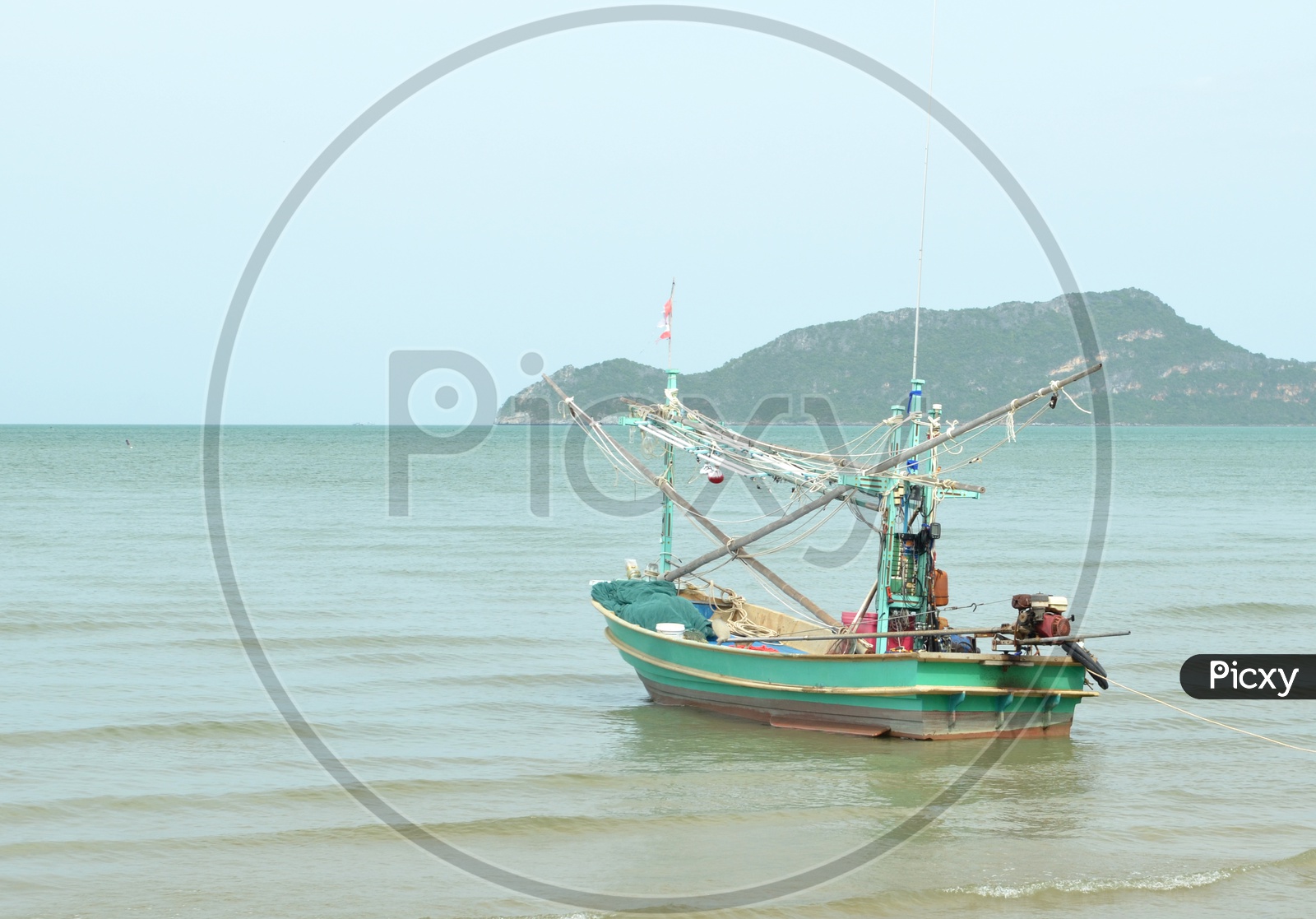 Lone Fishing Boat or Trawler on Beach Waters