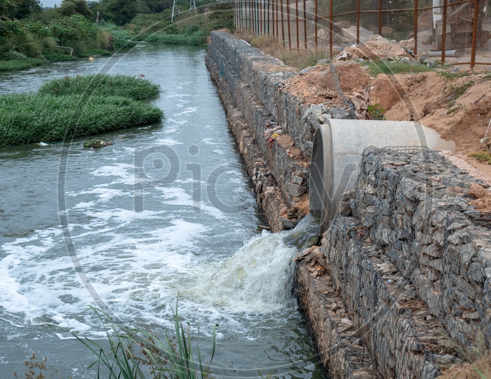 Drain Water or Sewage Water Flowing Into Canal Through Spun Pipes