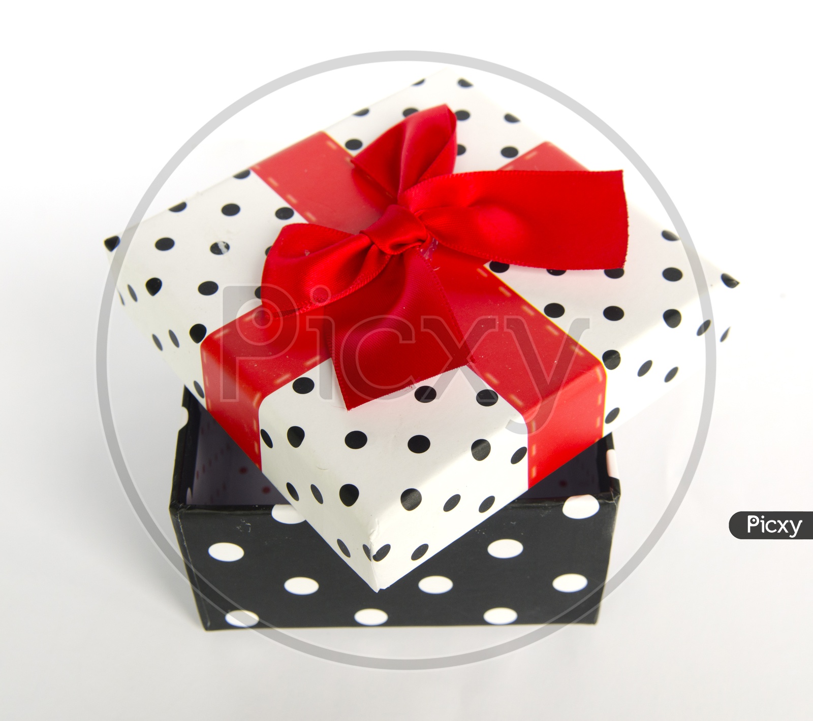 Gift Box With Red Ribbon On an isolated White background