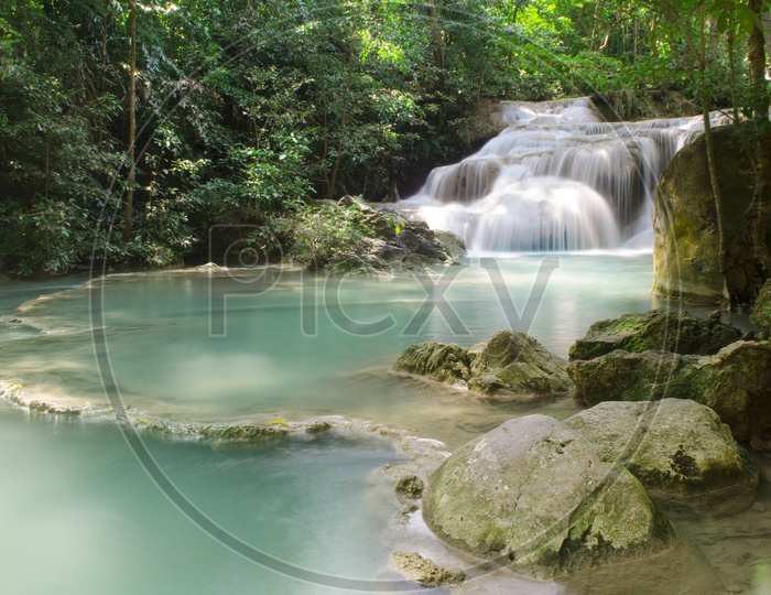 Emerald waterfall With a beautiful Slow Shutter Silky texture Of Water Flow