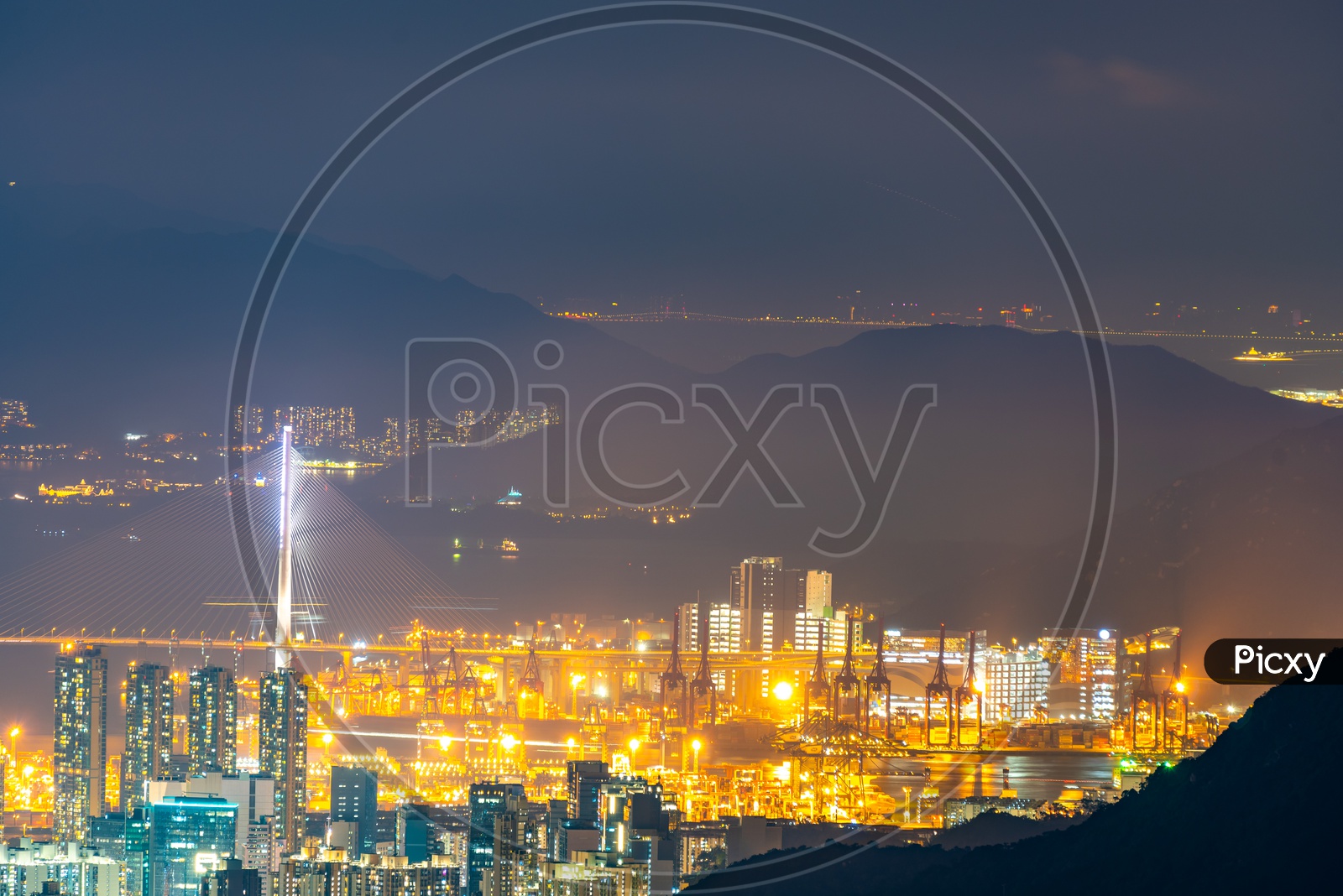 Hong Kong City Night Scape With Cable Suspension bridge over a River