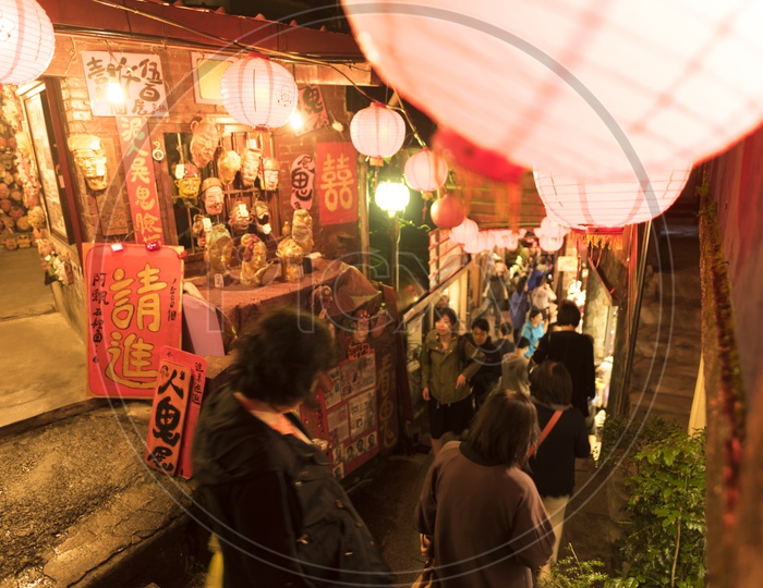 Tourists Shopping In Night Street Market at Jiufen