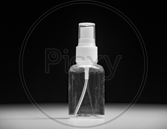 Empty cosmetic bottle container isolated on black background