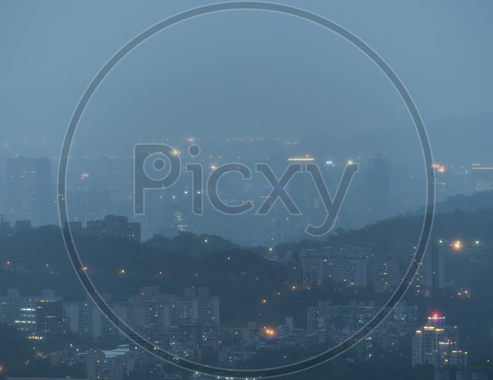 Night Scape Of Taipei City With City Lights and High Rise Buildings  From Elephant Mountain Hiking Trail