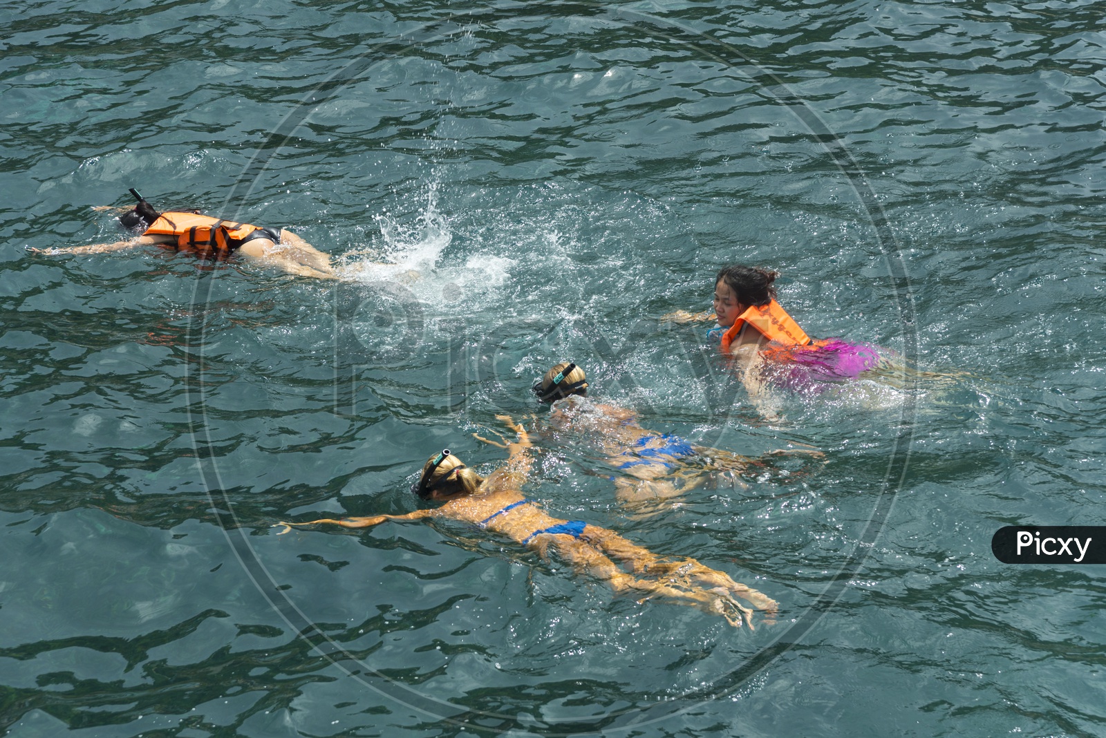Tourist Woman Wearing Bikini And Swimming in Sea At Phuket