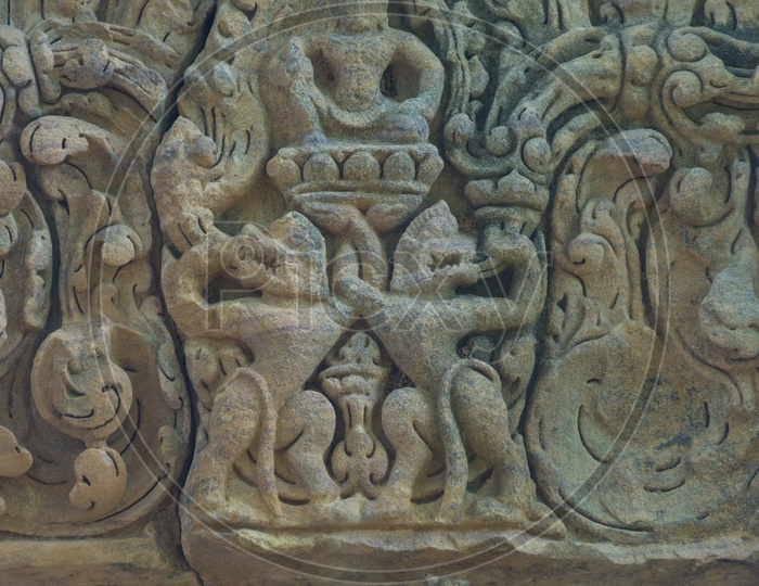 Stone Sculptures on Ancient Buddha Temple Walls