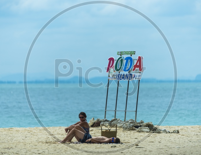 Tourists Enjoying  on Phuket Beach in  Poda Island
