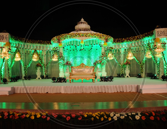 Indian Wedding Stage with focus lights and maharaja chair
