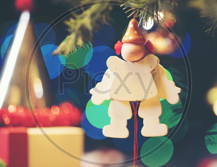 Decorated Christmas tree on blurred, sparkling and fairy Light Background