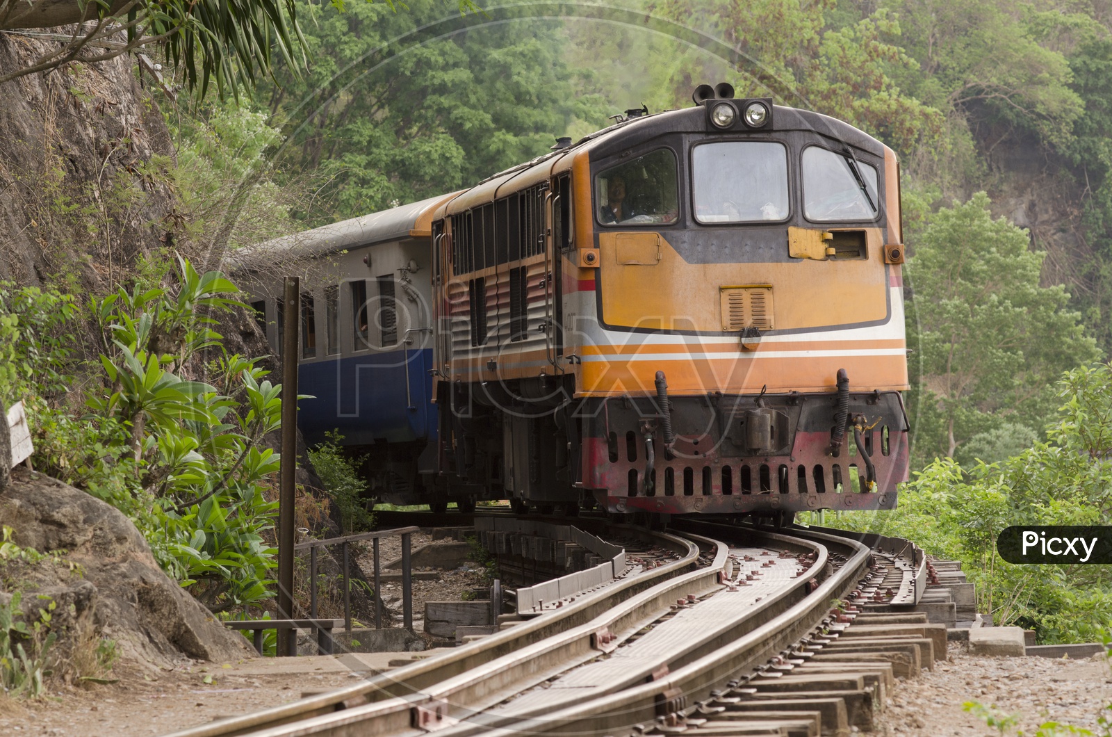 Moving train at death railway, Kanchanaburi, Thailand