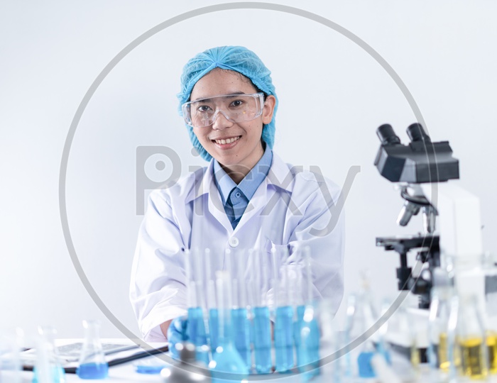 Researcher in the laboratory Studying with chemicals And microscopes