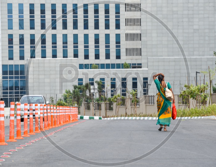 Indian Woman In Saree Walking Towards Corporate Office