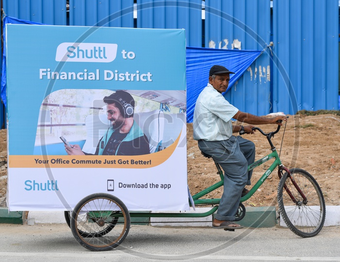 An Old Man Riding Shuttl  Advertisement Rickshaw