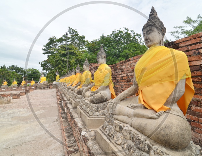 Ancient Buddha statues at the temple of Wat Yai Chai Mongkol in Ayutthaya near Bangkok, Thailand
