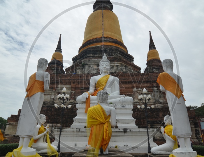 Ancient Buddhas and Pagoda in Wat Yai Chai Mongkol at Ayutthaya, Thailand