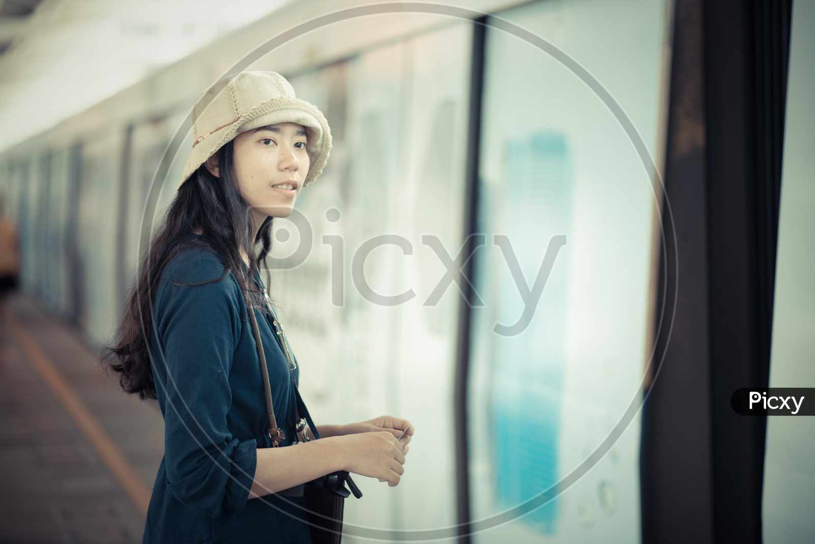 Asian traveler women on sky train station