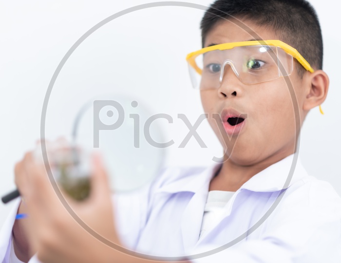 Curious Boy Wearing Laboratory Glasses