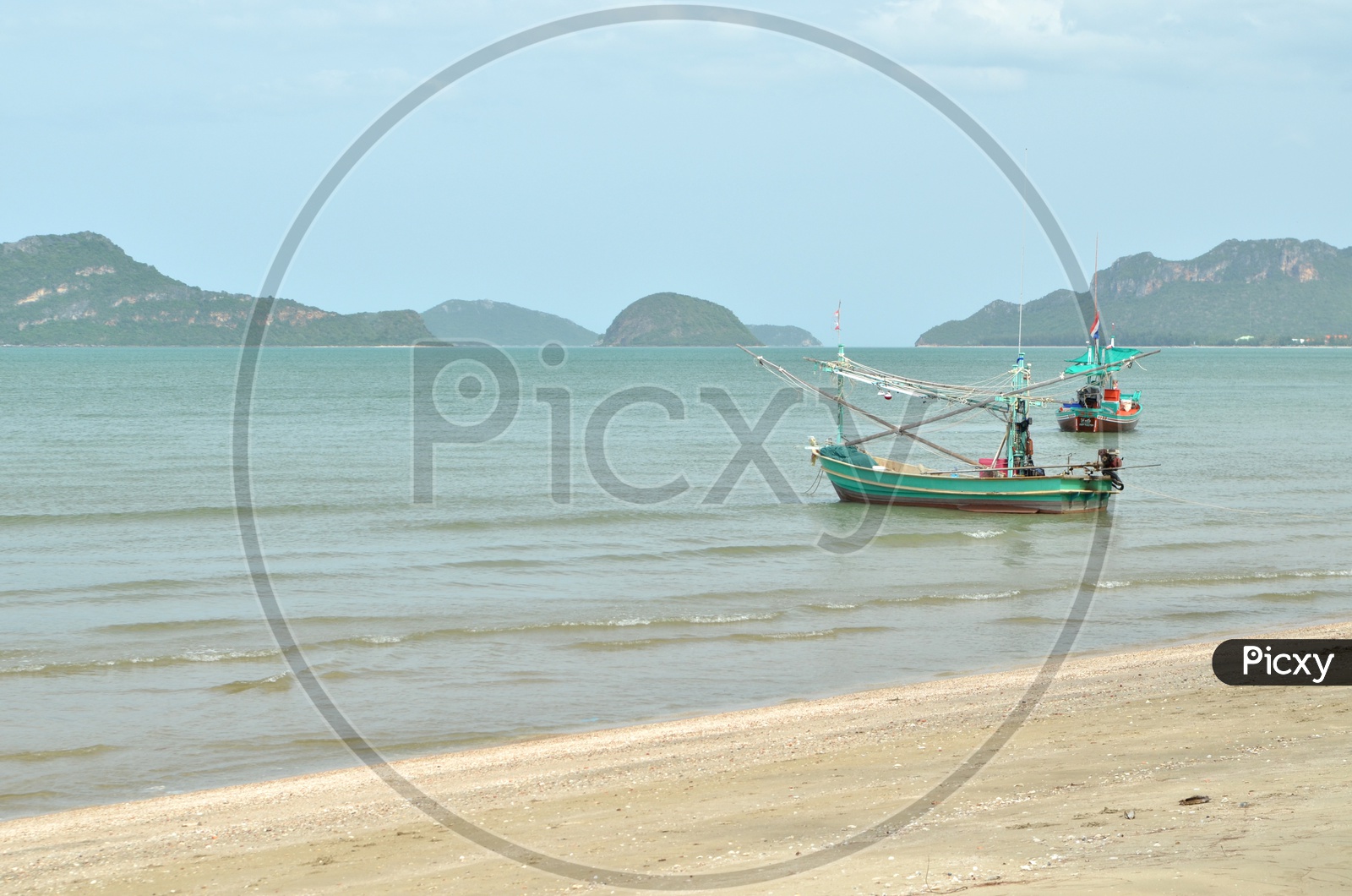 Trawler Boat Or Fishing Boat on a Beach Waters