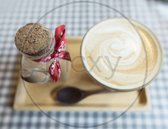 hot coffee latte art with sugar Bottle