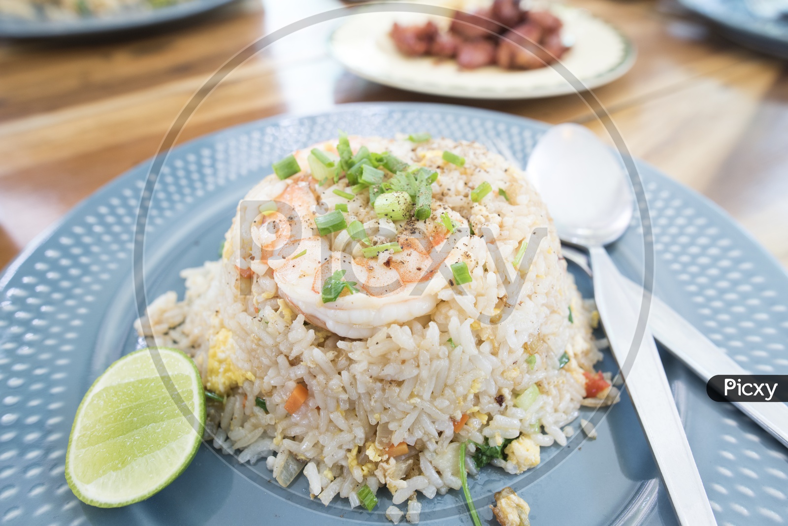Fried Rice With Shrimp And Garnished With pepper Powder