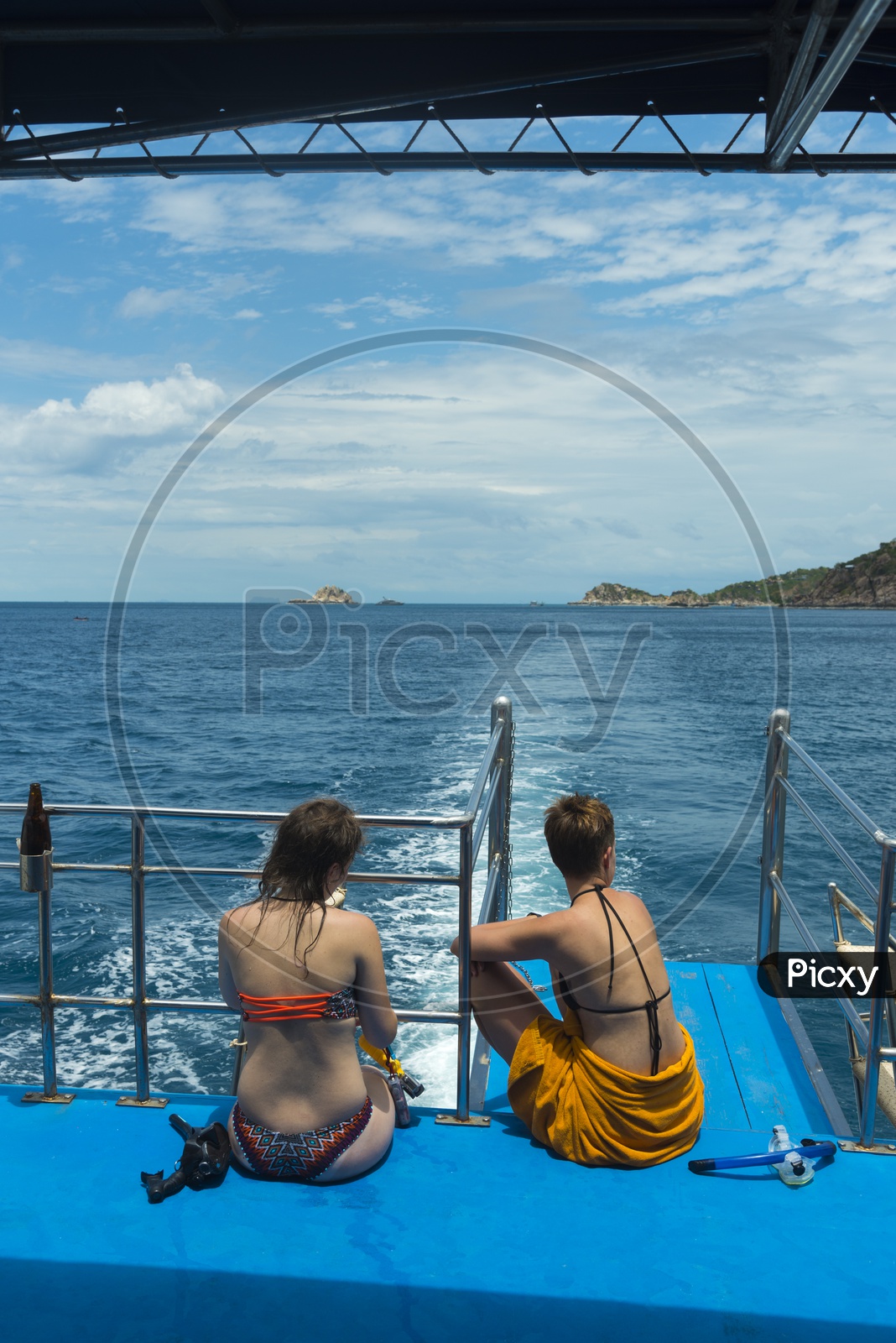 Young Woman Wearing Bikini And Enjoying The Yacht Rides in sea At  Phuket