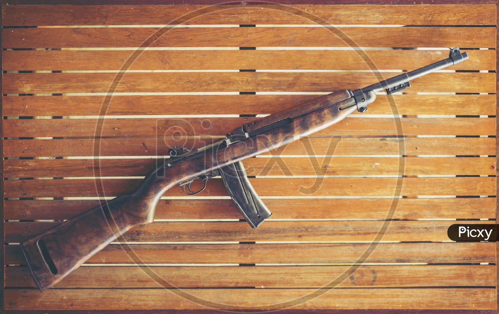 Ancient Machine Gun Used in World War II  On Wooden Background
