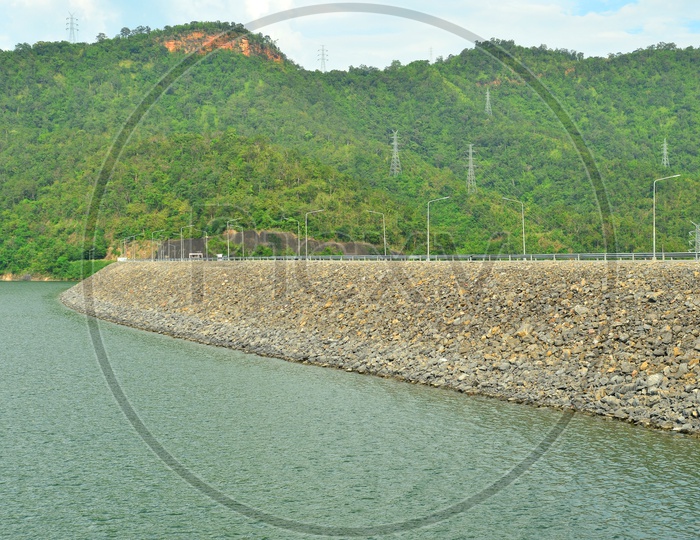 Water Storage in a Dam with mountains in the background