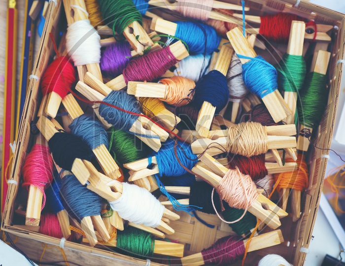 Close up of colorful spool of embroidery threads