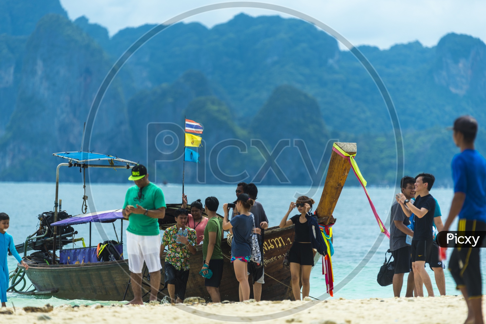Tourists Enjoying On Phuket Beach