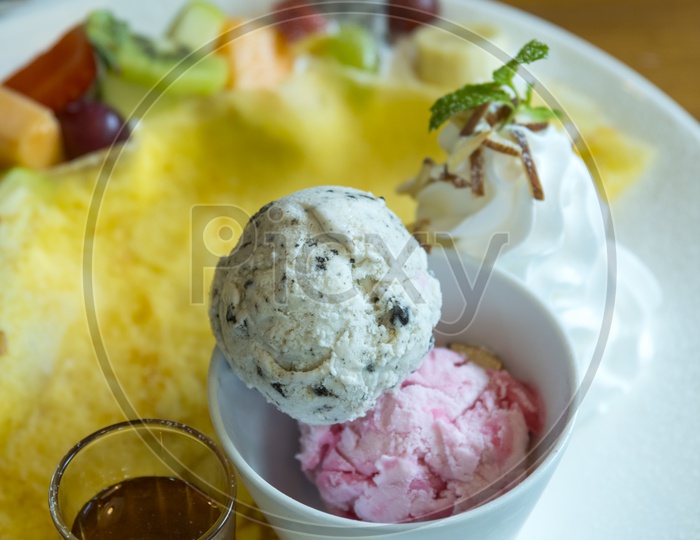 Ice-cream With Fresh Fruit Salad And Fruit Crape Cake