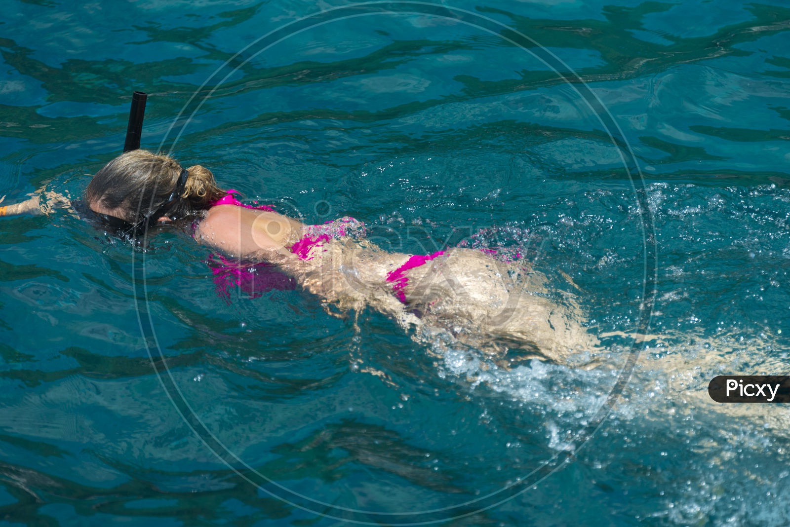 A Tourist Swimming In Sea Wearing Bikini At Phuket beach