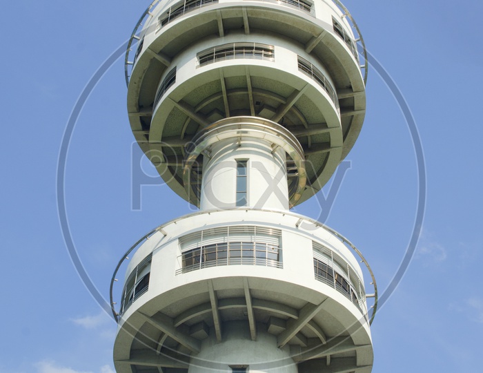Air traffic control tower with blue sky