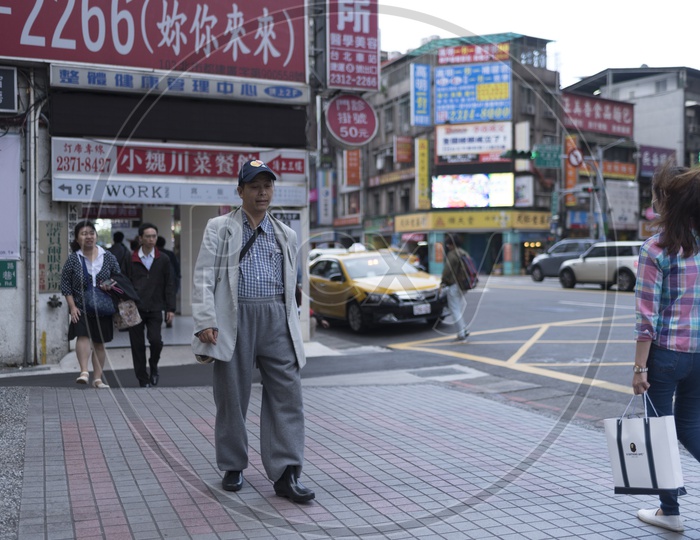Pedestrians  Walking on Footpaths in Taipei City