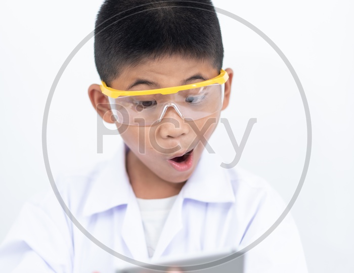 Curious boy Enjoying Learning In a Laboratory