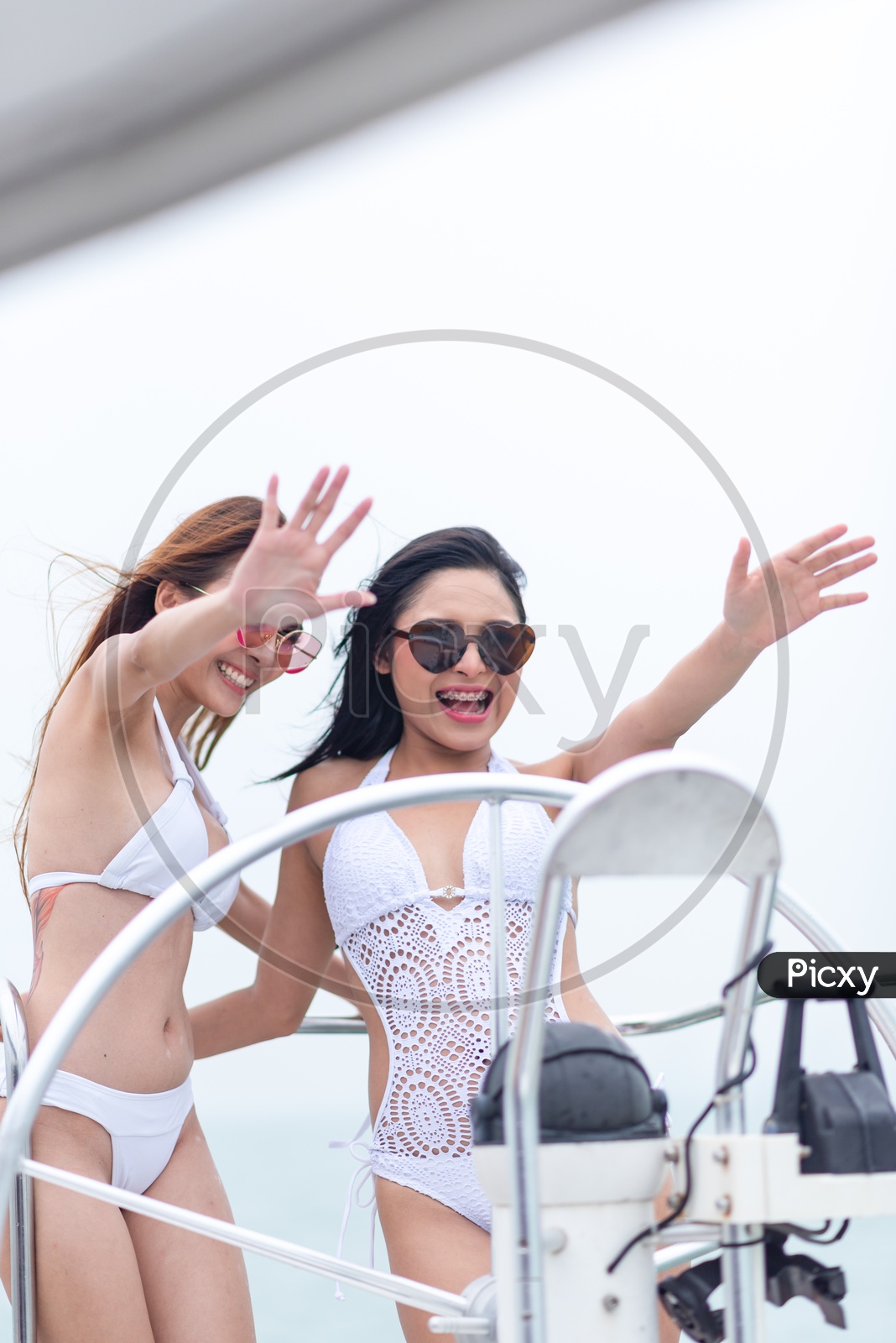 Asian beautiful  Woman Or Girls wearing Bikini and Posing  In a Pool Party On a Yacht