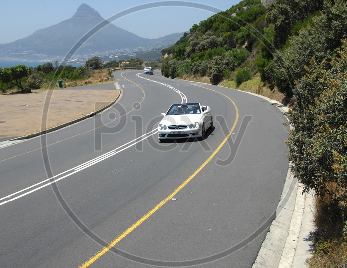 Car moving along the curvy moutain road