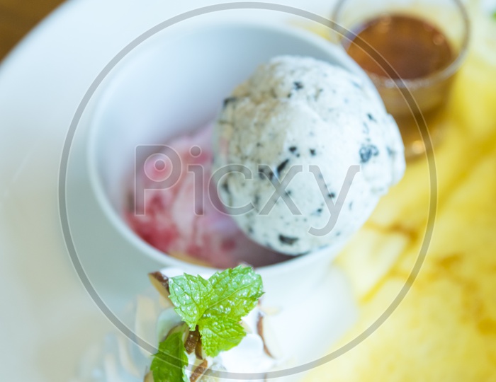 Ice-cream With Fresh Fruit Salad And Fruit Crape Cake
