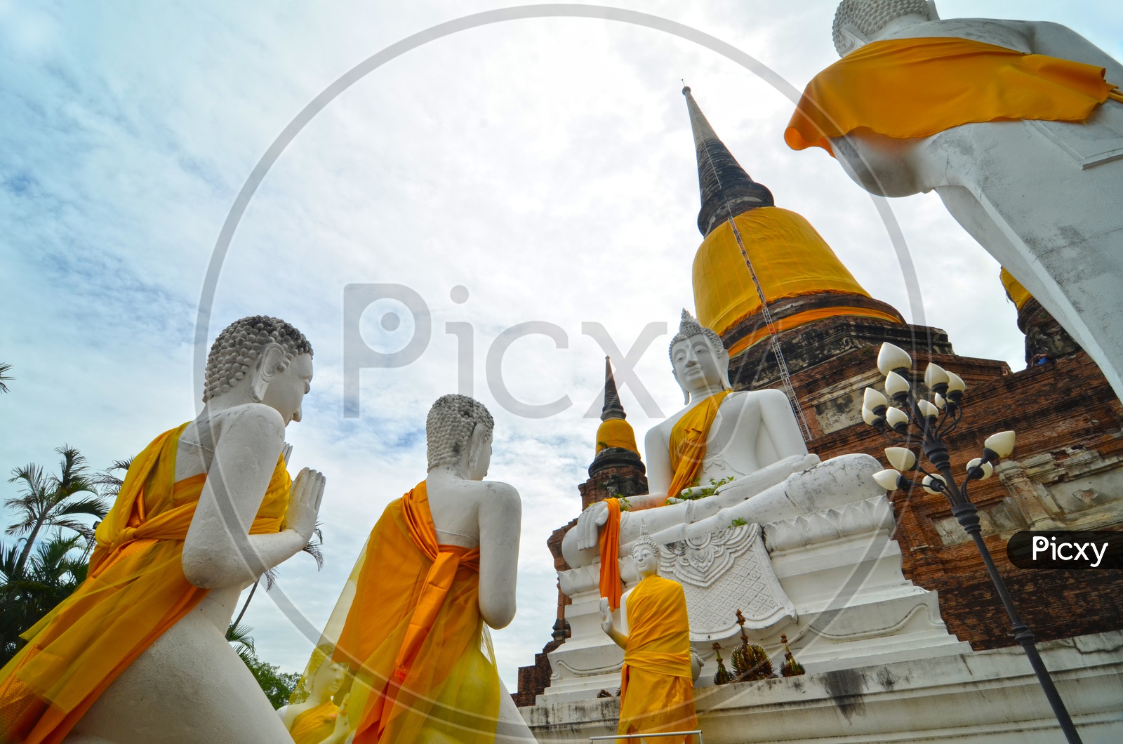 Ancient Buddha Statues  and Pagoda in Wat Yai Chai Mongkol at Ayutthaya in Thailand