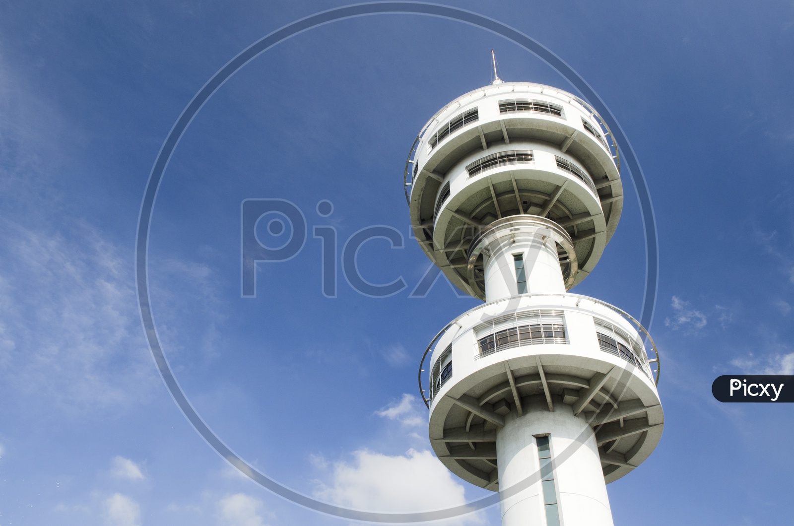 Air traffic control tower with blue sky