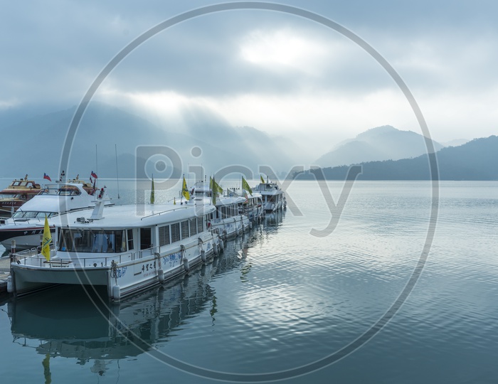 Pier At Sun Moon Lake With Tourists Boats or Yacht Boats A famous Tourist Attraction In Taiwan