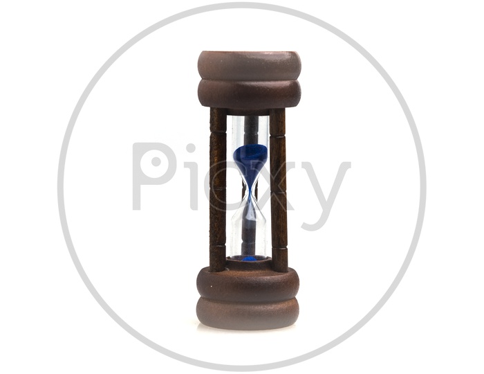 Sand timer or Hourglass made of wood isolated on white