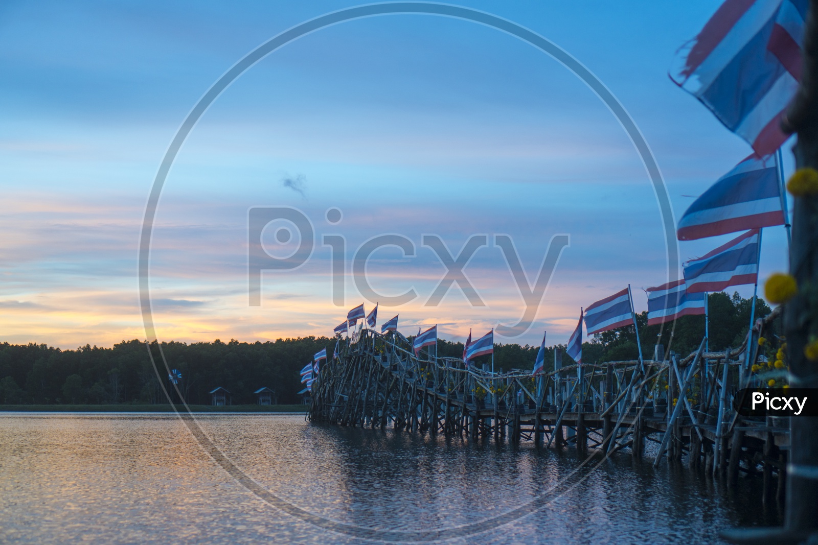 Lake with Wooden Bridge Or Pier With Sunset Blue hour Sky