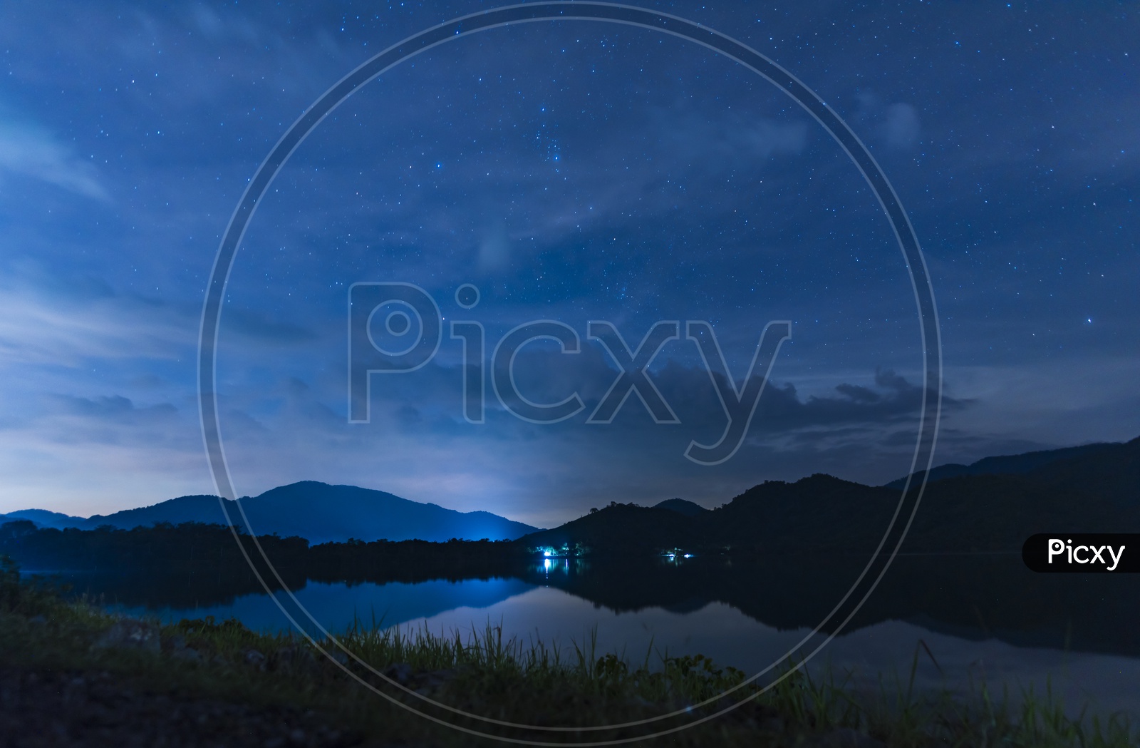 landscape of  night sky With Galaxy Star Gazing Over The Lake With Blue Sky