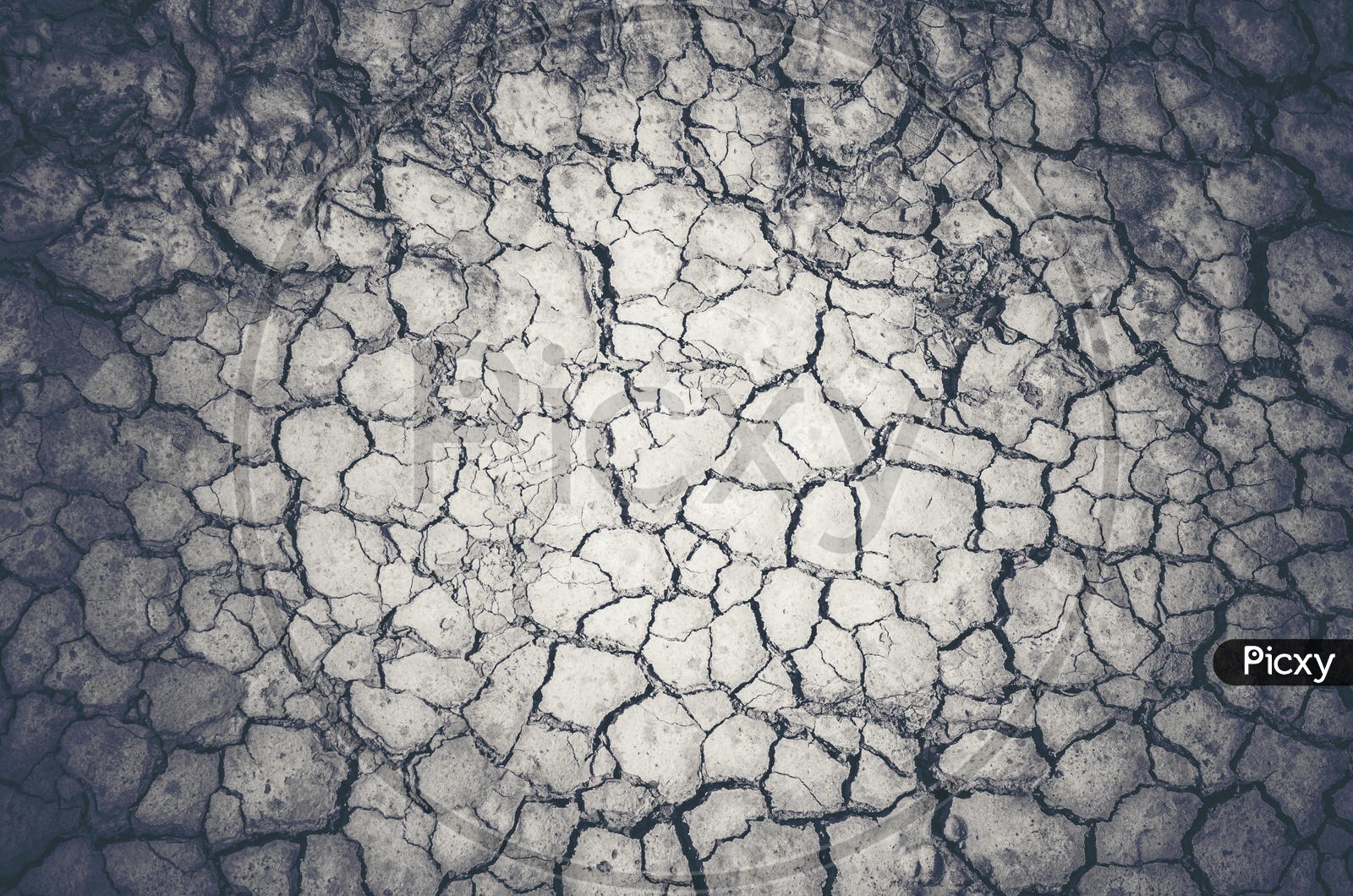 Drought Land With Dry Cracked Soil Texture With B&W Filter