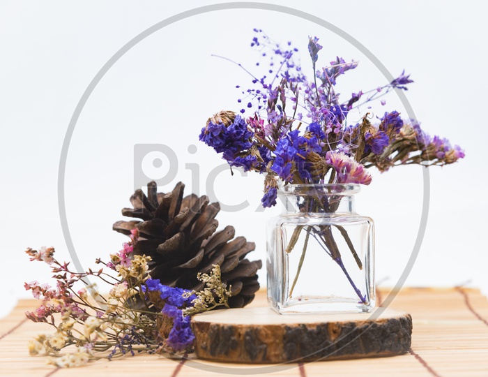 Beautiful vintage flower bouquet in glass vase isolated on white background