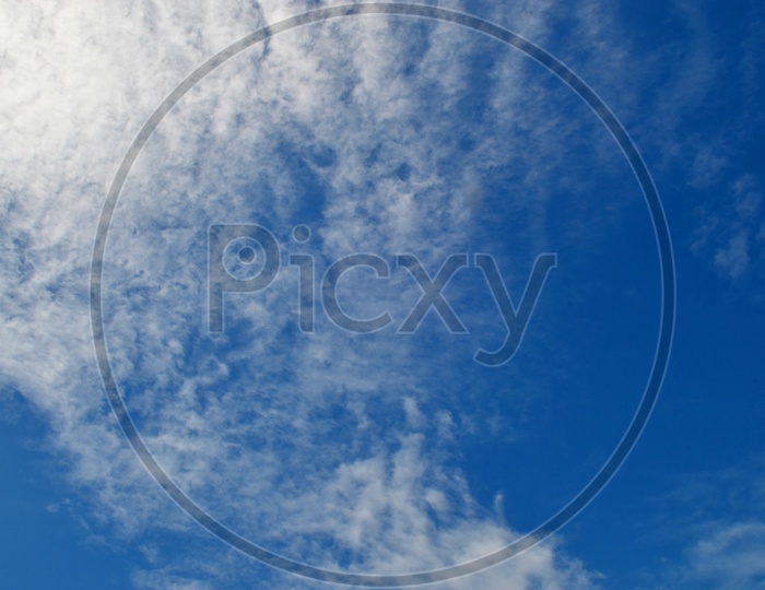 Blue sky With Cotton Clouds  background.
