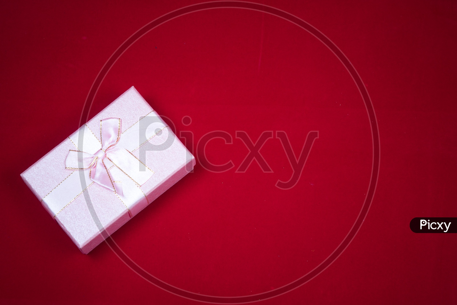 Gift Box On Isolated Red background with Space